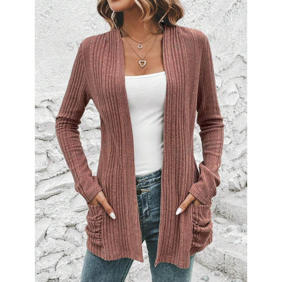 Women's fine knit cardigan with deep V-neck and practical pockets, size