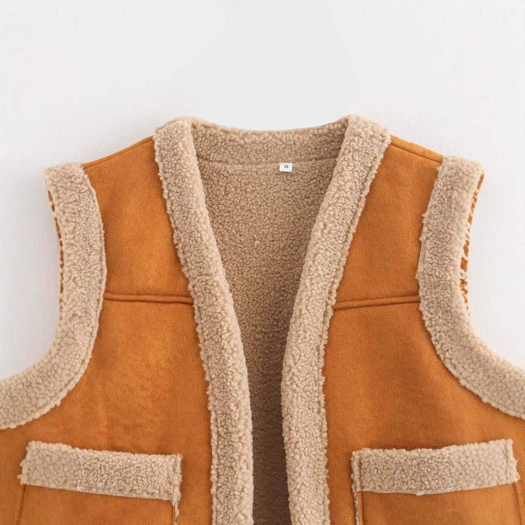 Women's teddy vest with practical pockets and high collar, size