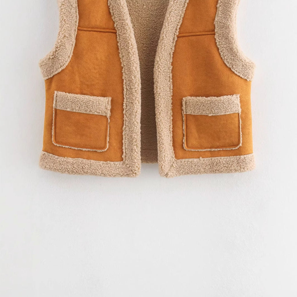 Women's teddy vest with practical pockets and high collar, size