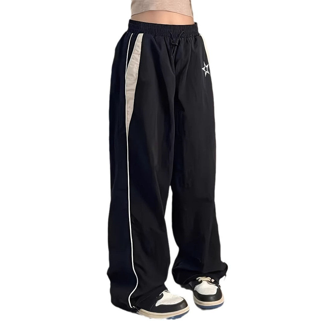Women's sporty wide-leg trousers with side stripes and elasticated waistband, size