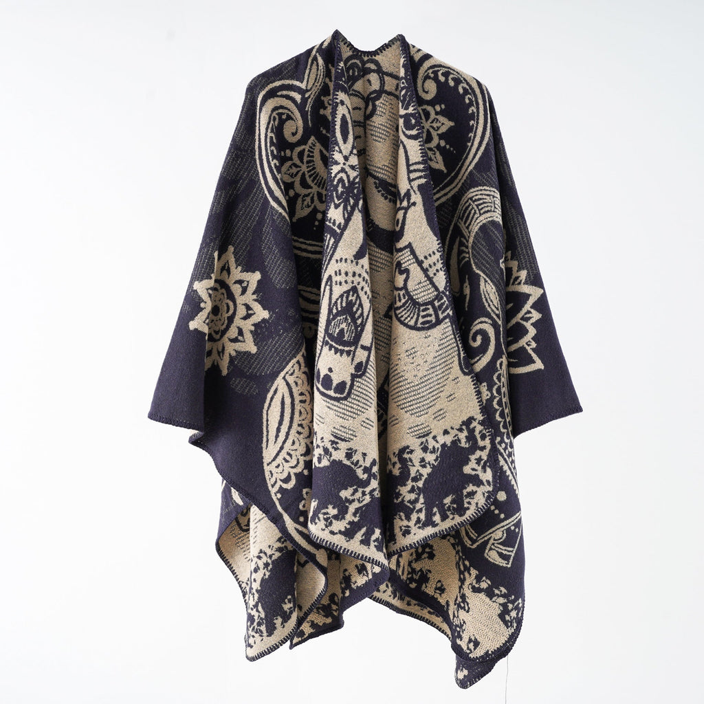 Women's elegant transitional poncho with an artistic floral pattern and fringed edges, size GR