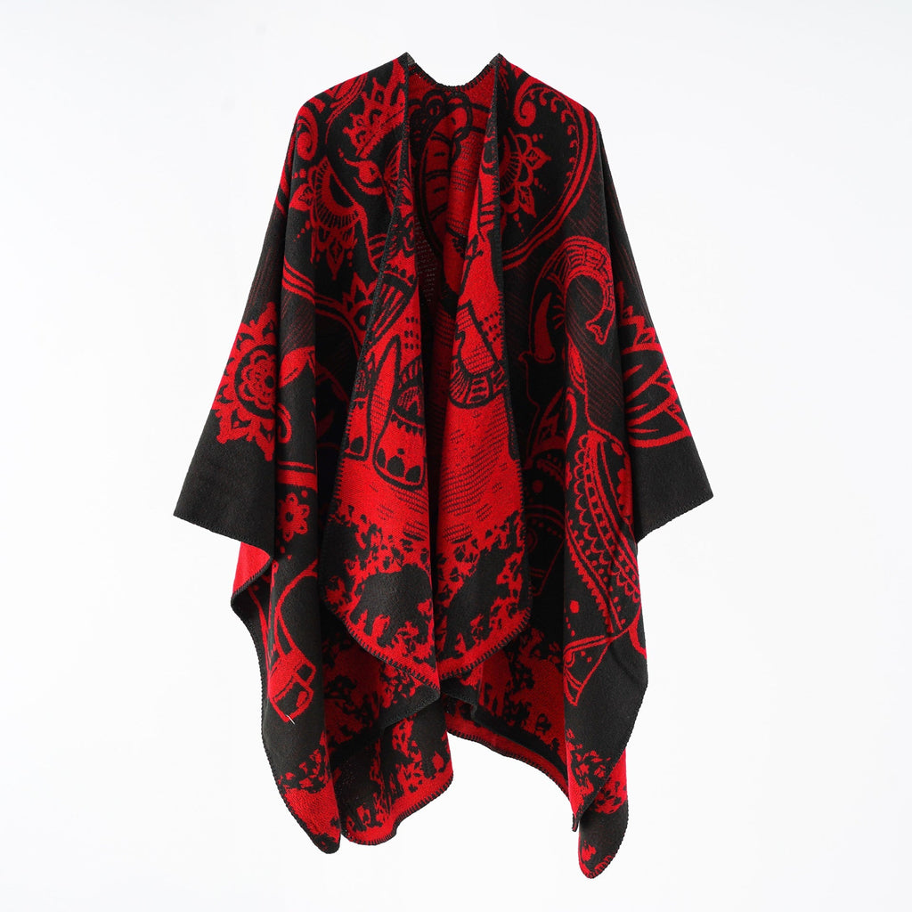 Women's elegant transitional poncho with an artistic floral pattern and fringed edges, size GR