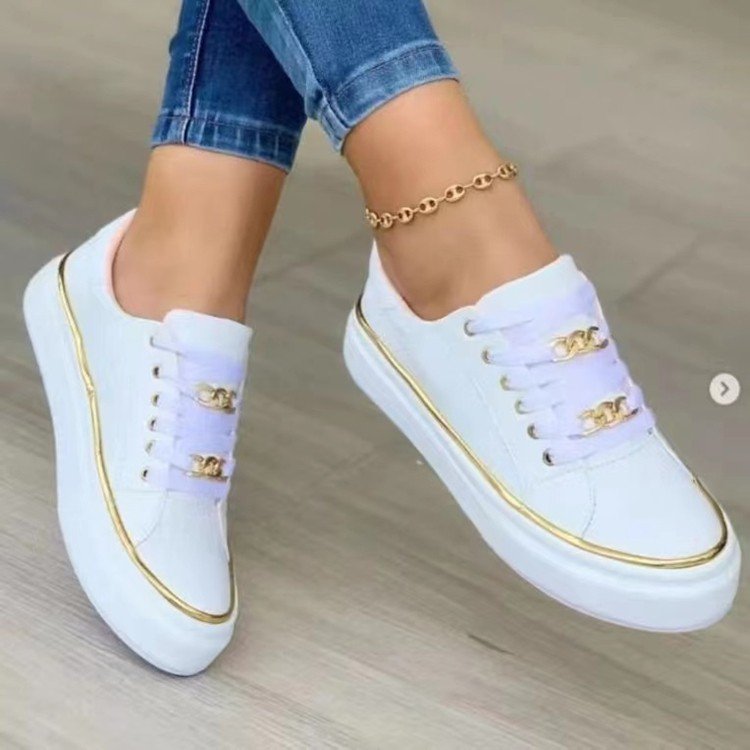 Women's sneakers with a fashionable satin upper and elegant gold accents, size GR