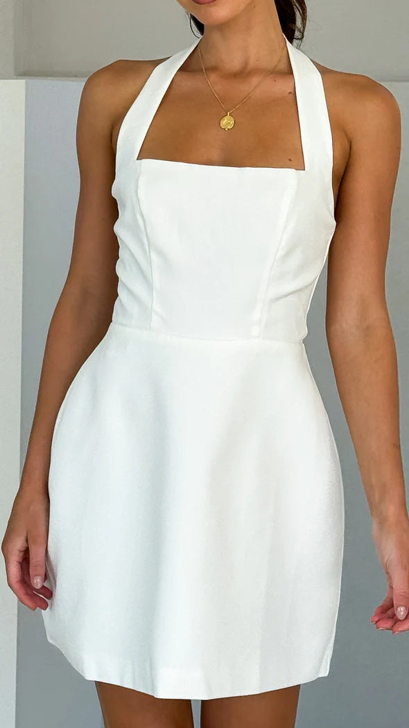 Women's mini dress with a flowing cut and elegant halter details, size S
