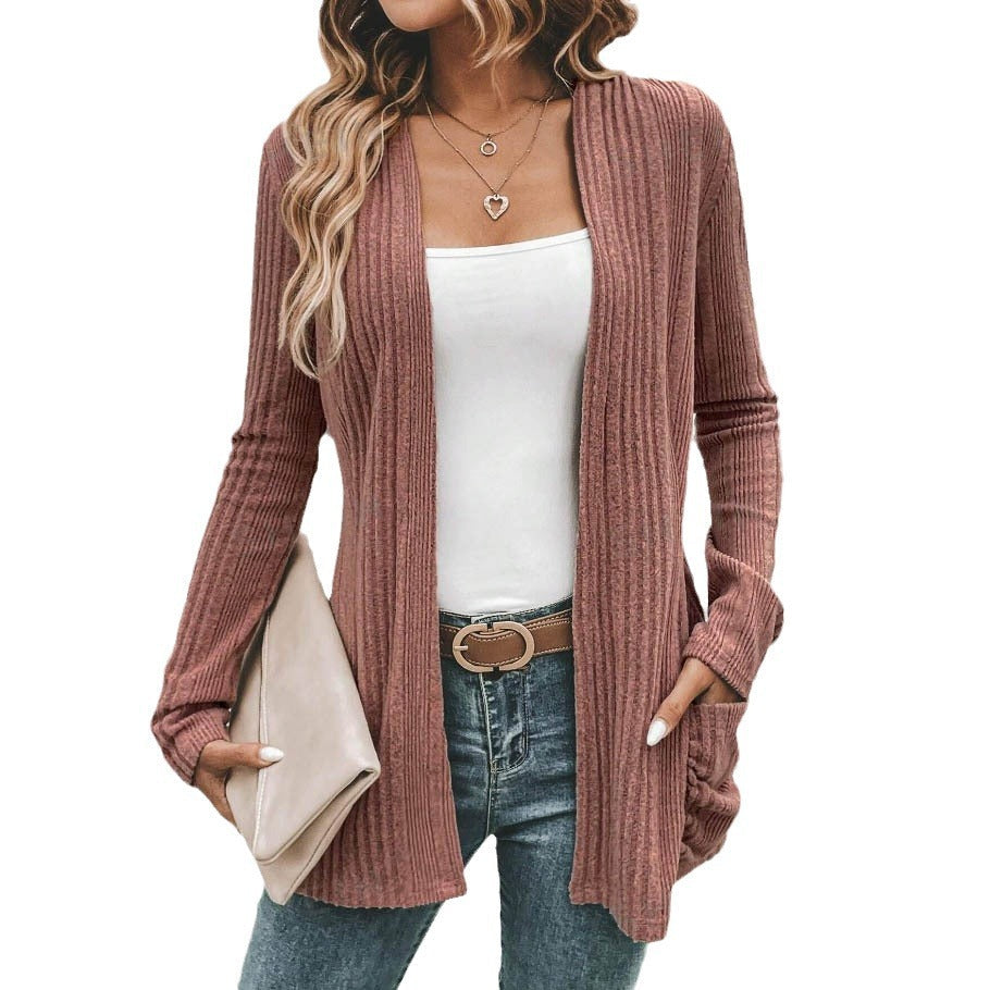 Women's fine knit cardigan with deep V-neck and practical pockets, size