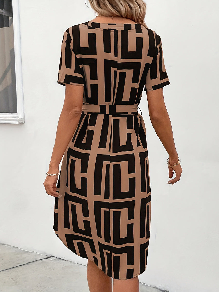 Women's dress with modern geometric pattern and adjustable waist belt, size S