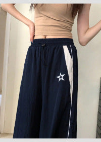 Women's sporty wide-leg trousers with side stripes and elasticated waistband, size