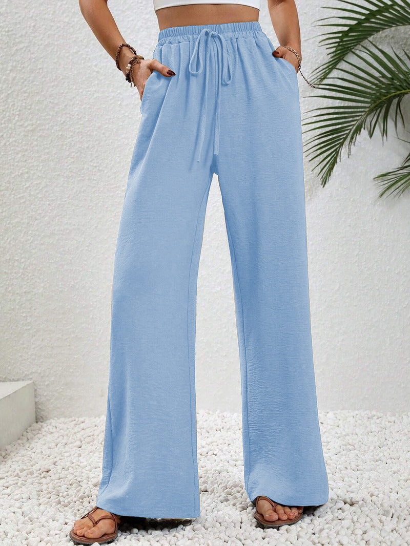 Women's casual, wide-legged leisure trousers with elasticated waistband and side pockets, size S