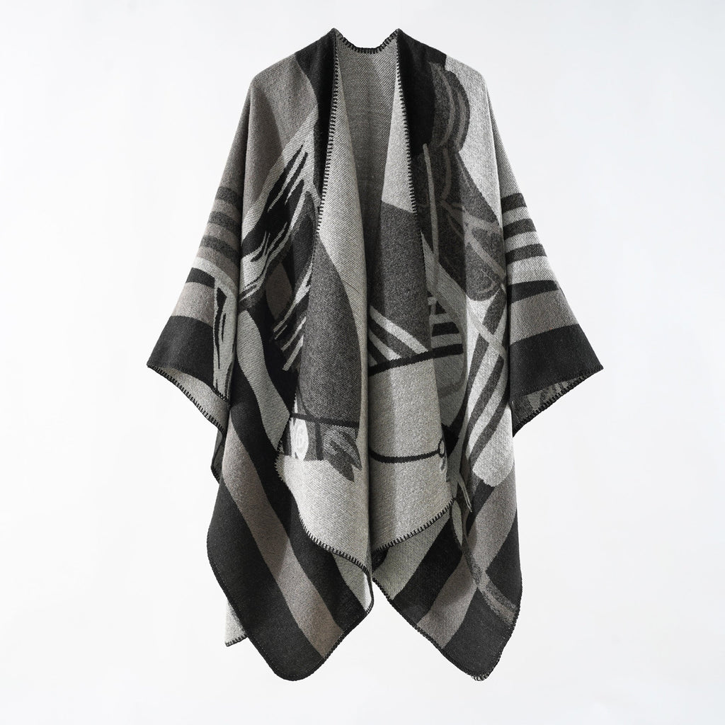 Women's elegant knitted poncho with artistic pattern and fine fringe, size GR