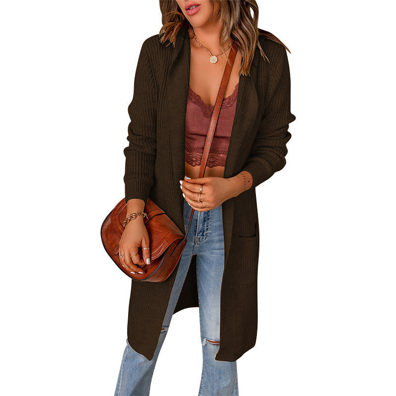 Women's knitted coat with deep V-neck and generous pockets, size