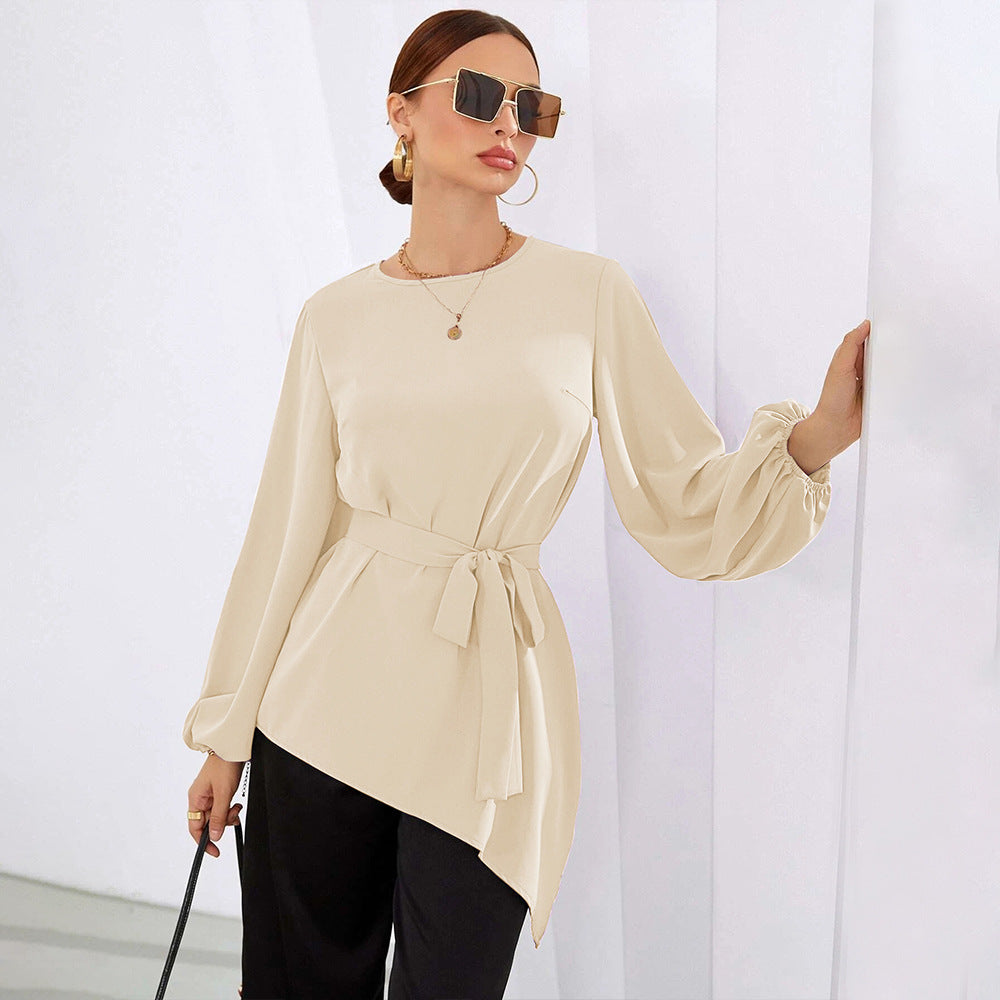 Women's asymmetrical blouse top with elegant ruffles and fashionable waist belt, size S