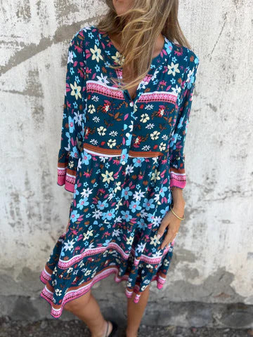 Women's boho-chic dress with floral patterns and button placket, size [size missing]