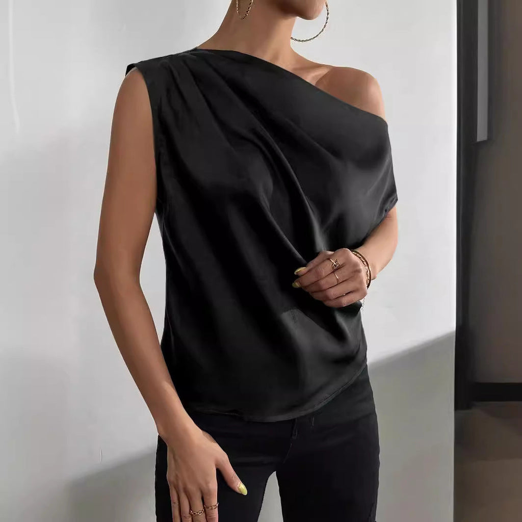 Women's asymmetrical top with draping and elegant cut, size