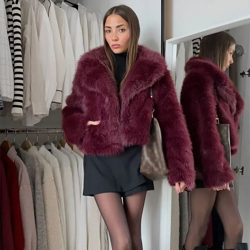 Women's faux fur jacket with a voluminous collar and elegant cut, size S