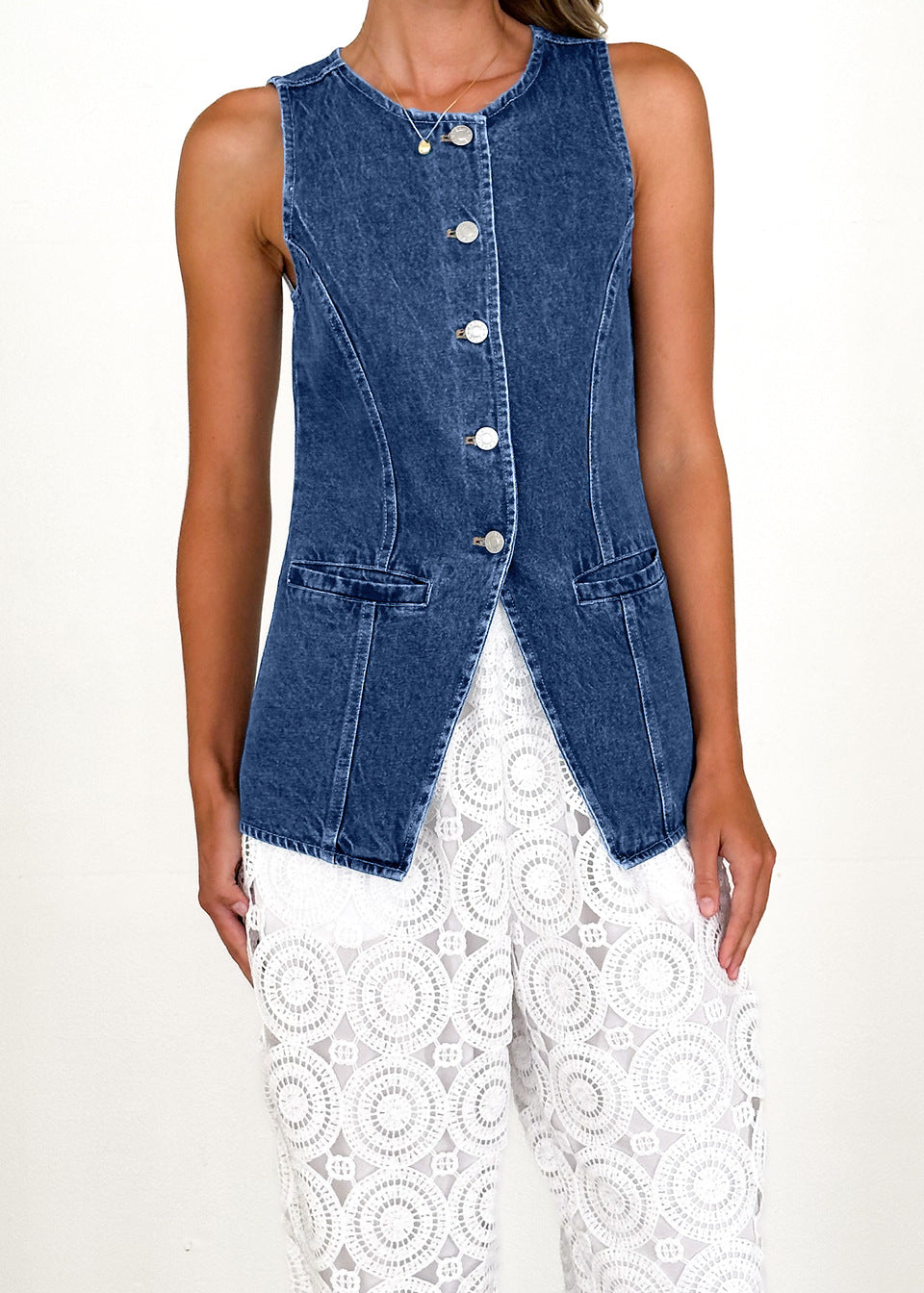 Women's denim shirt jacket with a modern cut and button details, size S