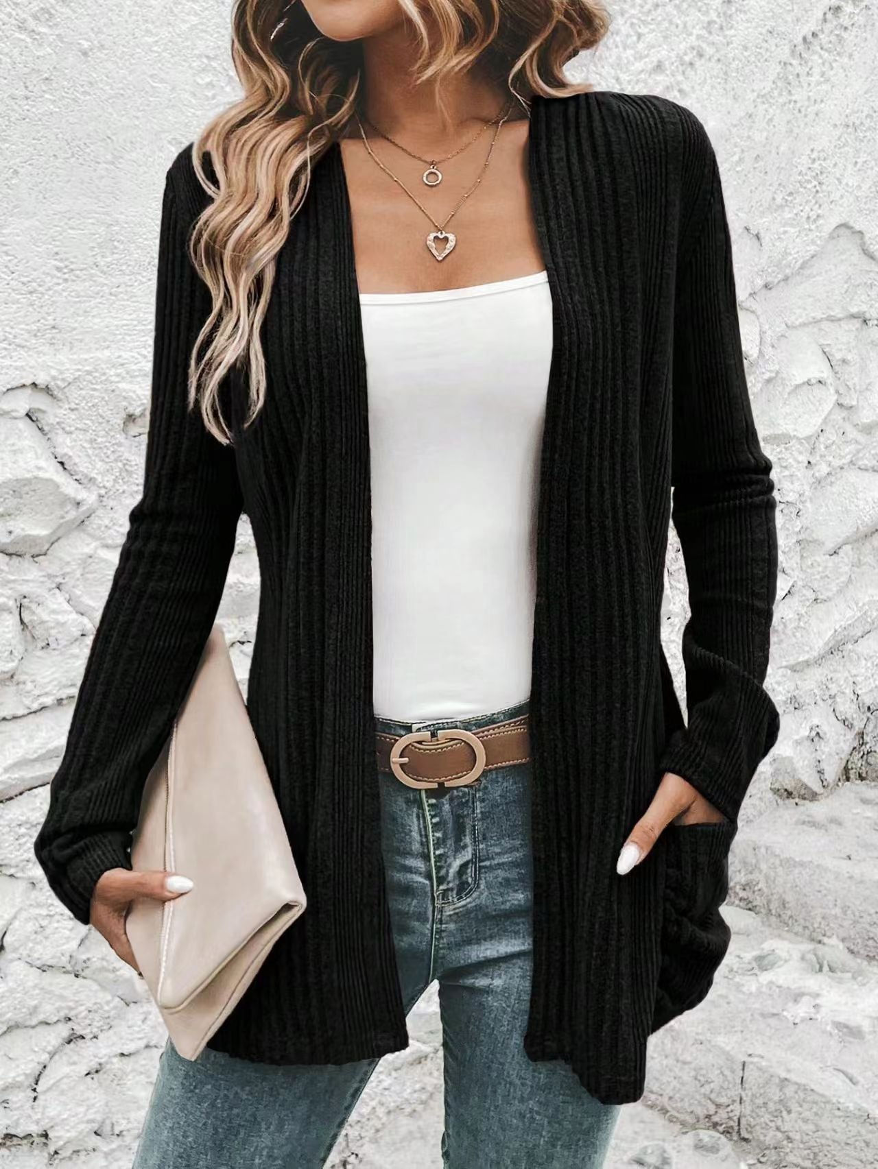 Women's fine knit cardigan with deep V-neck and practical pockets, size