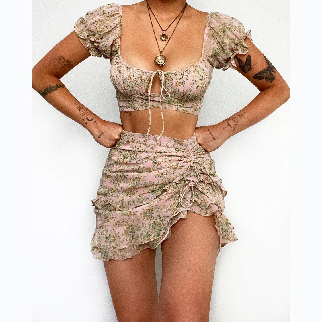 Women's crop top and mini skirt with floral design, size