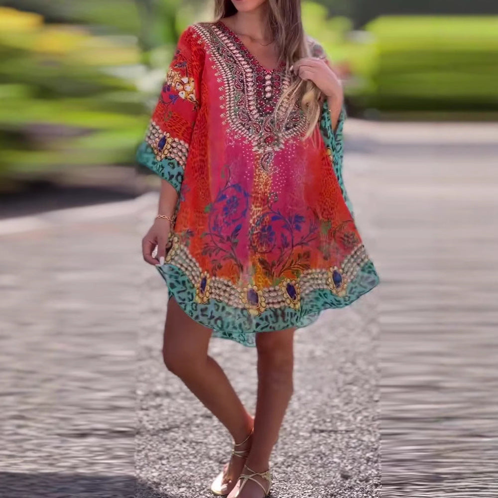 Damen Strandkleid im farbenfrohen Boho-Stil mit verspieltem Design und tiefem V-Ausschnitt GR