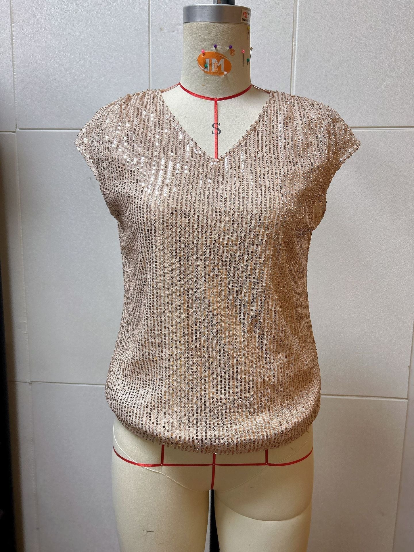 Women's glittery top with a V-neck and loose fit, size [size missing]