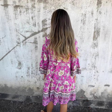 Women's boho-chic dress with floral patterns and button placket, size [size missing]