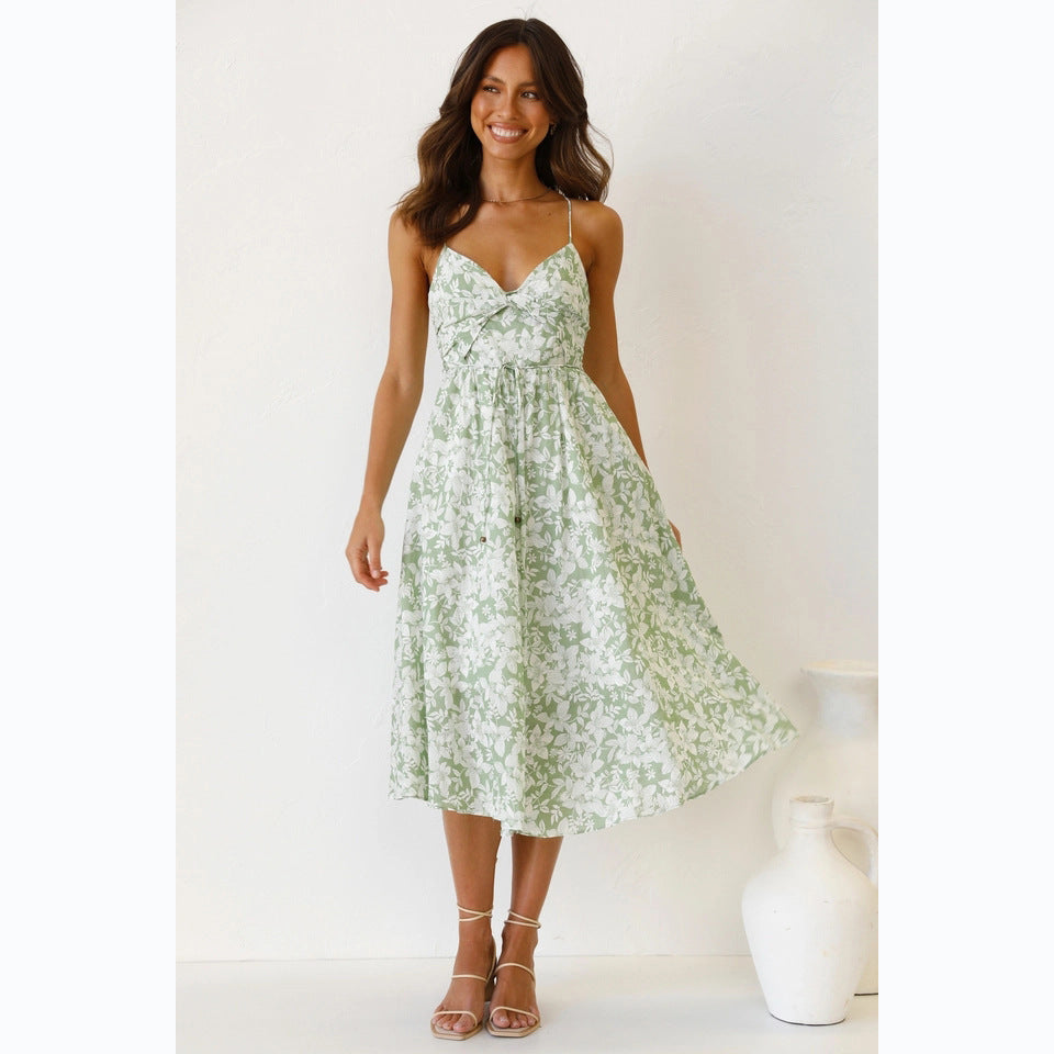 Women's midi dress with floral pattern and adjustable spaghetti straps, size