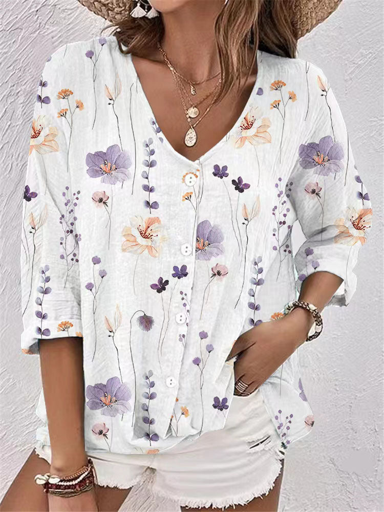 Women's blouse with floral print and modern button design, size