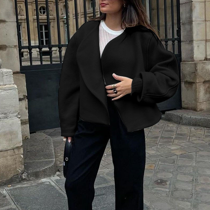 Women's short jacket made of cozy material with a wide cut and elegant details, size S
