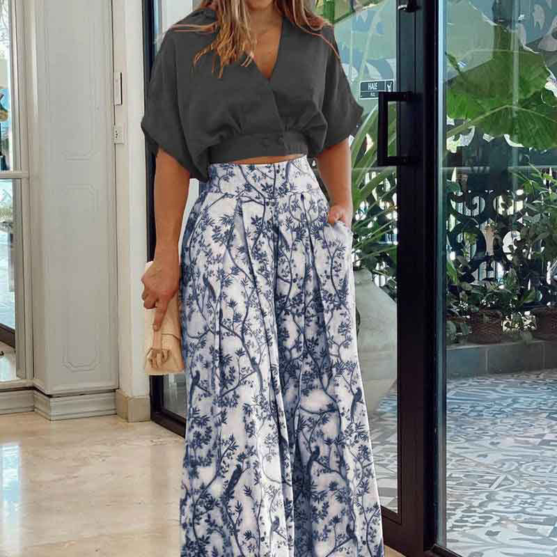 Women's crop top suit with wide skirt and floral pattern, size