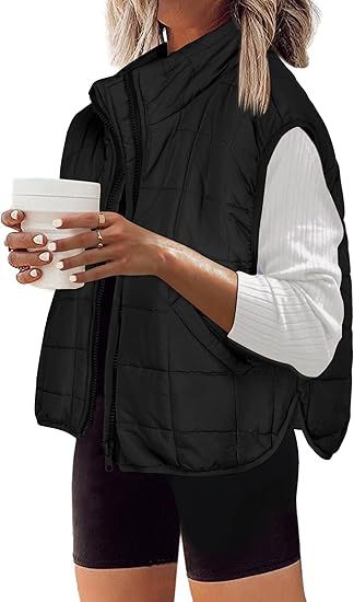 Women's quilted vest with high collar and practical side pockets, size