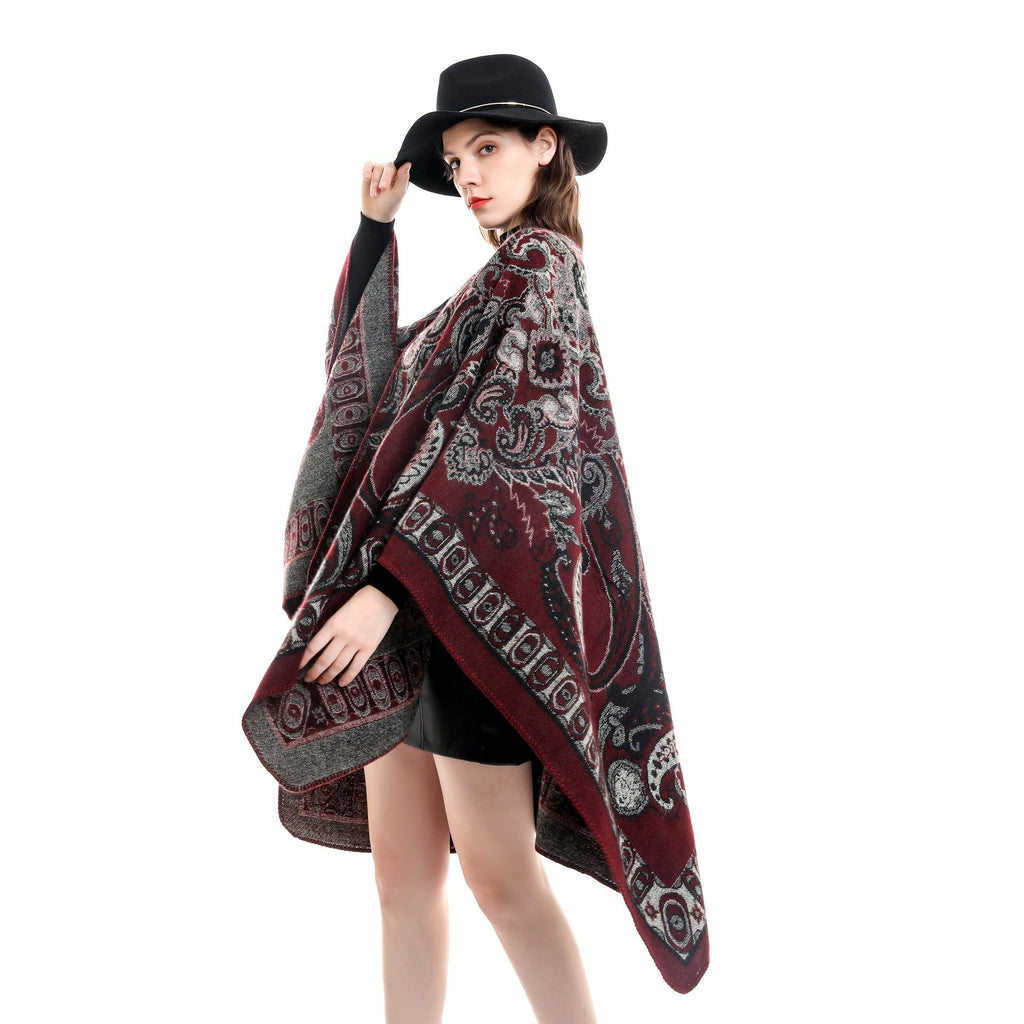 Women's elegant poncho with an artistic floral pattern and luxurious feel (size not specified)