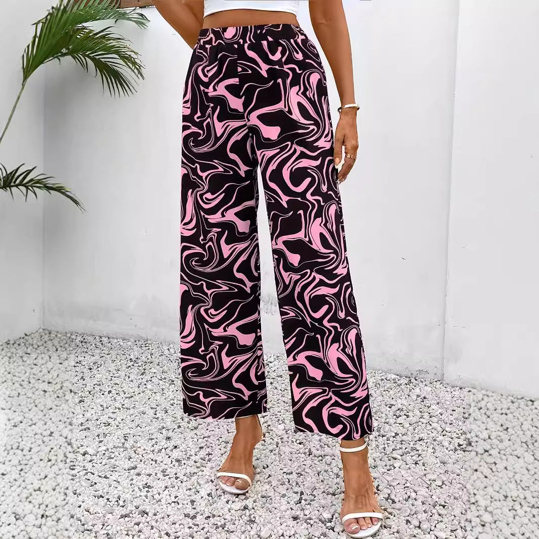 Women's wide-leg palazzo trousers with a modern marble print and elasticated waistband, size S