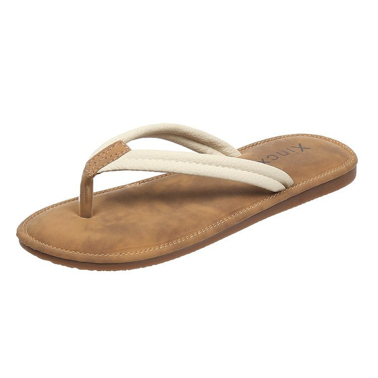 Women's thong sandals with a comfortable footbed and versatile design, size GR