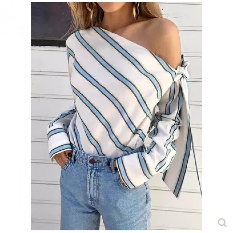 Women's asymmetrical blouse with stripes and playful ties, size