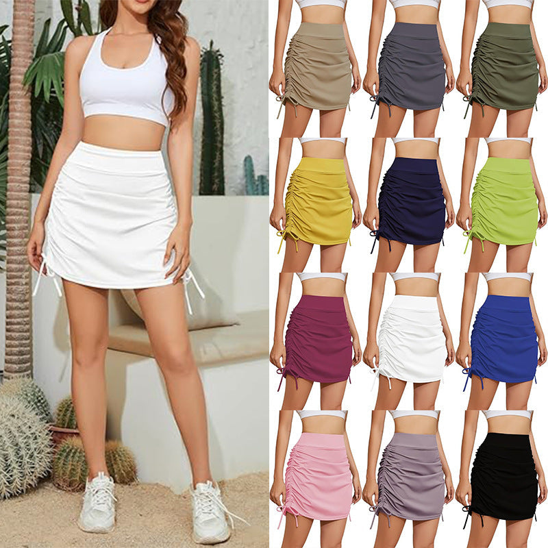 Women's sporty mini skirt with ruching, size