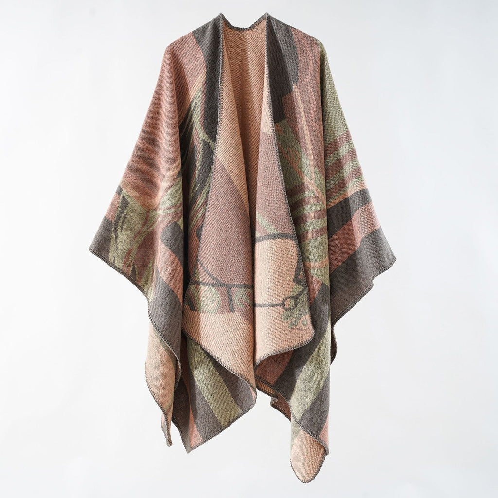 Women's elegant knitted poncho with artistic pattern and fine fringe, size GR
