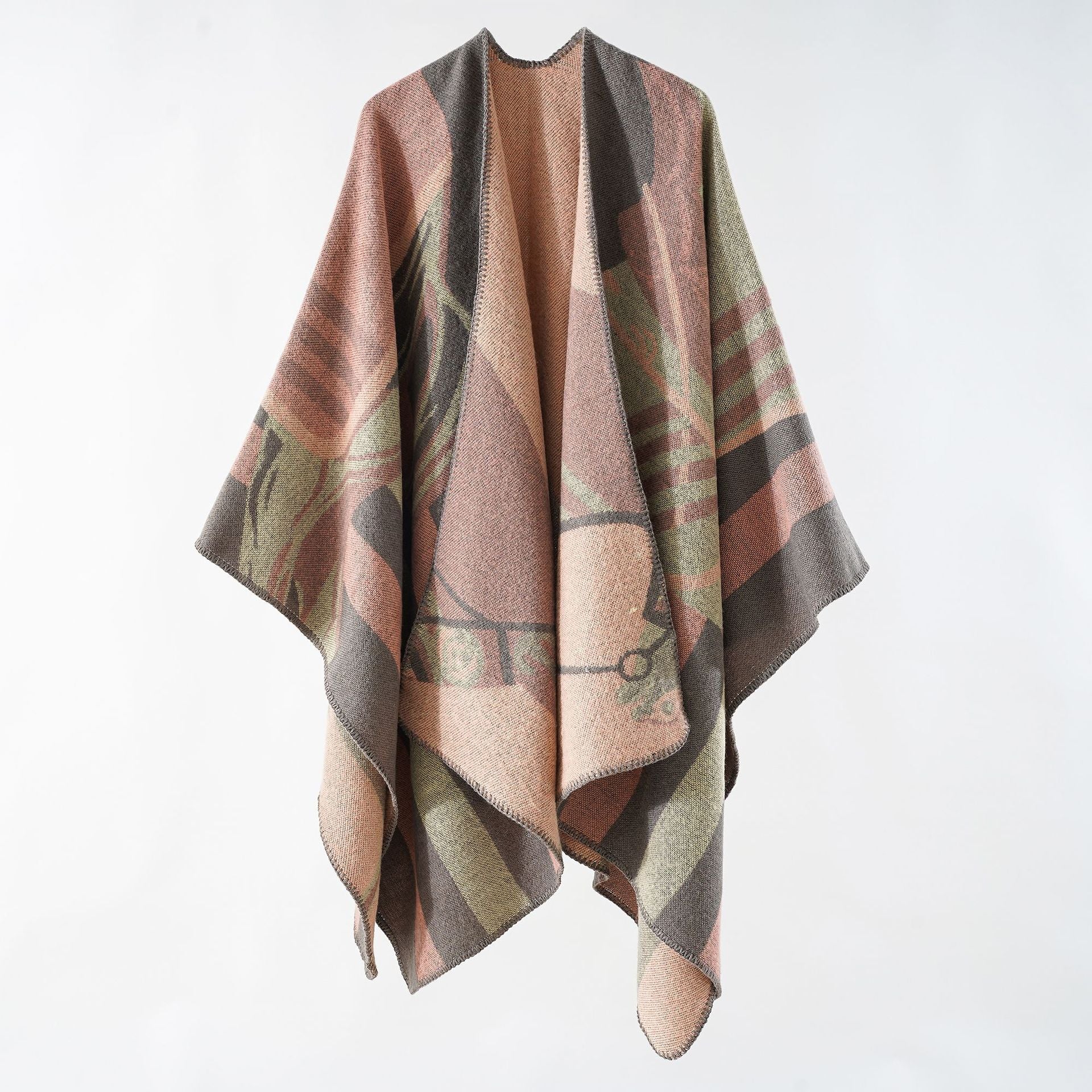 Women's elegant knitted poncho with artistic pattern and fine fringe, size GR