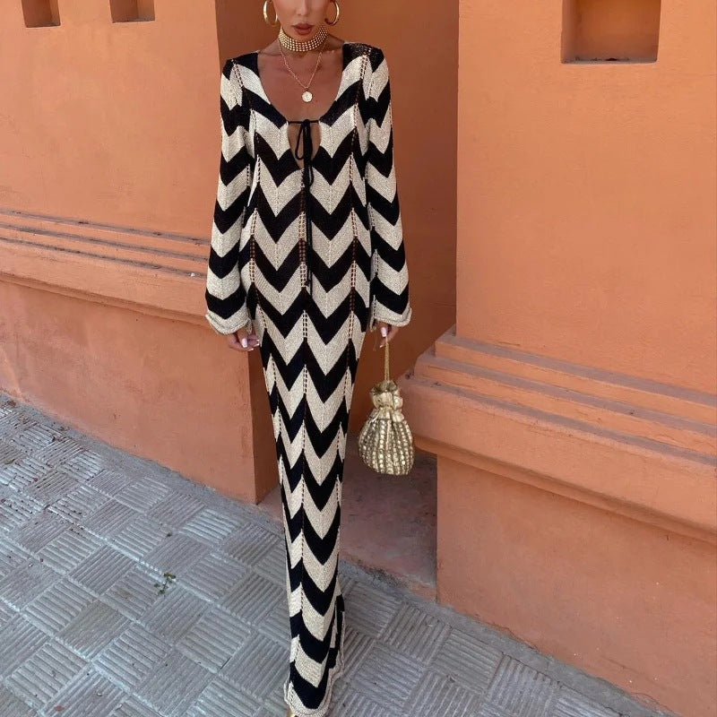 Women's knitted dress with a modern zigzag pattern and deep V-neck, size [size missing]