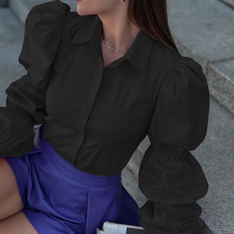 Women's blouse with voluminous puff sleeves and elegant cut, size S