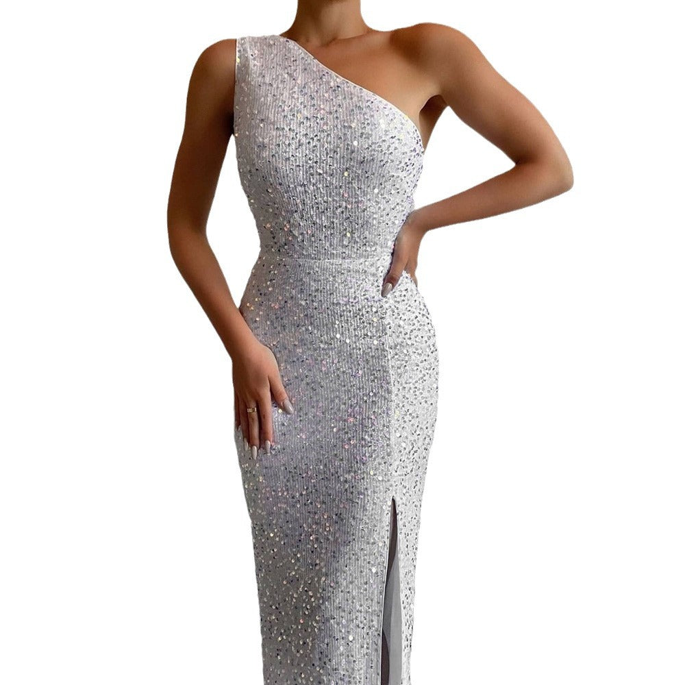Women's glamorous evening dress with asymmetrical neckline and shimmering details, size GR