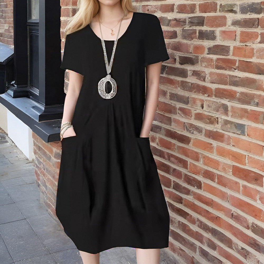 Women's casual short-sleeved dress with side pockets and a relaxed fit, size S