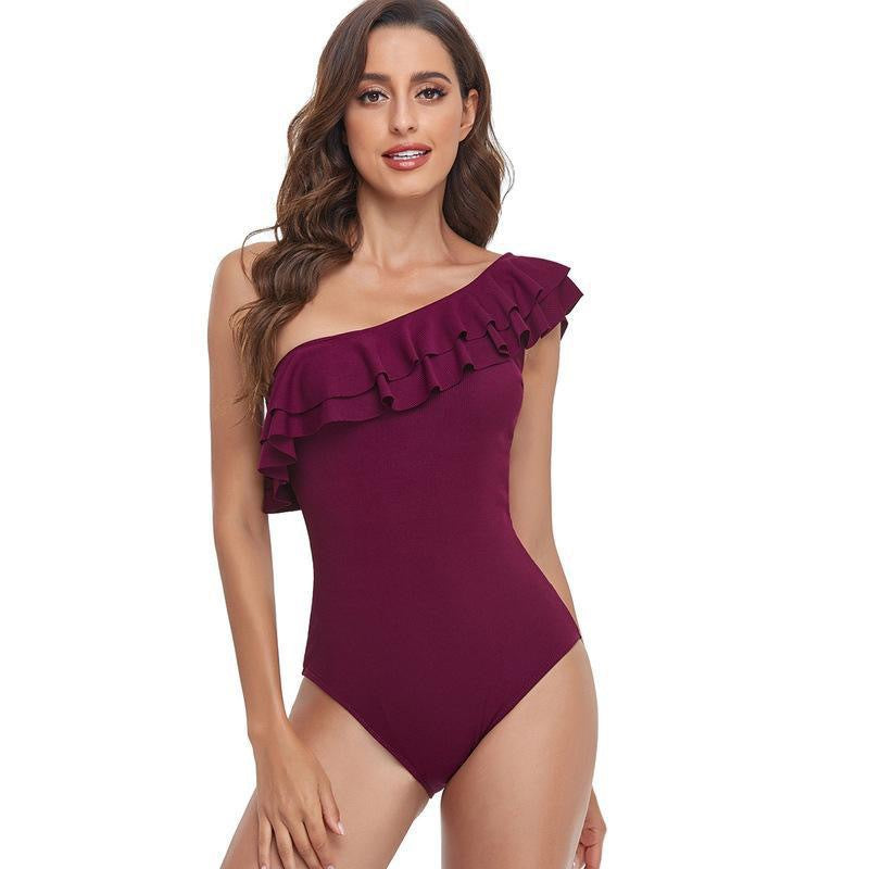 Women's one-piece swimsuit with asymmetrical cut and voluminous ruffle detail, size [size]