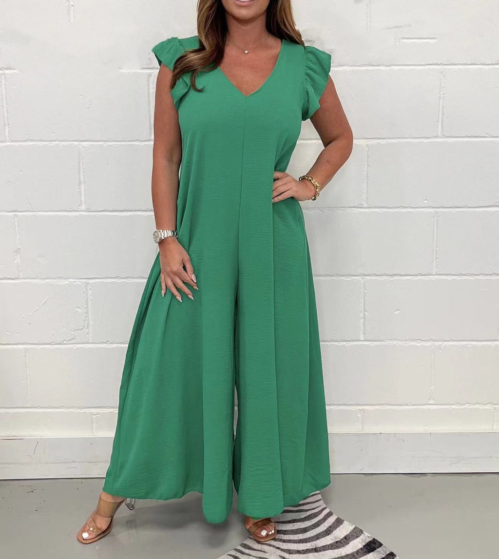 Women's upscale jumpsuit with voluminous ruffled sleeves and V-neck, size S