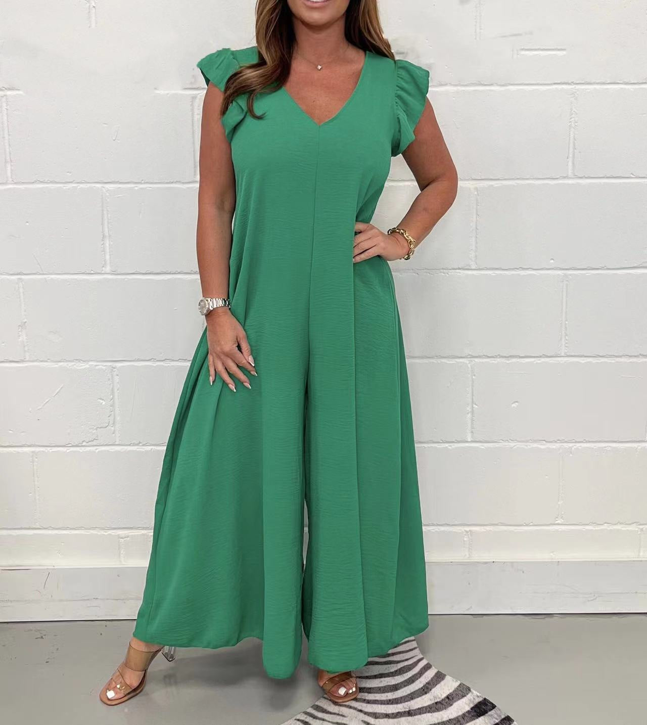 Women's upscale jumpsuit with voluminous ruffled sleeves and V-neck, size S
