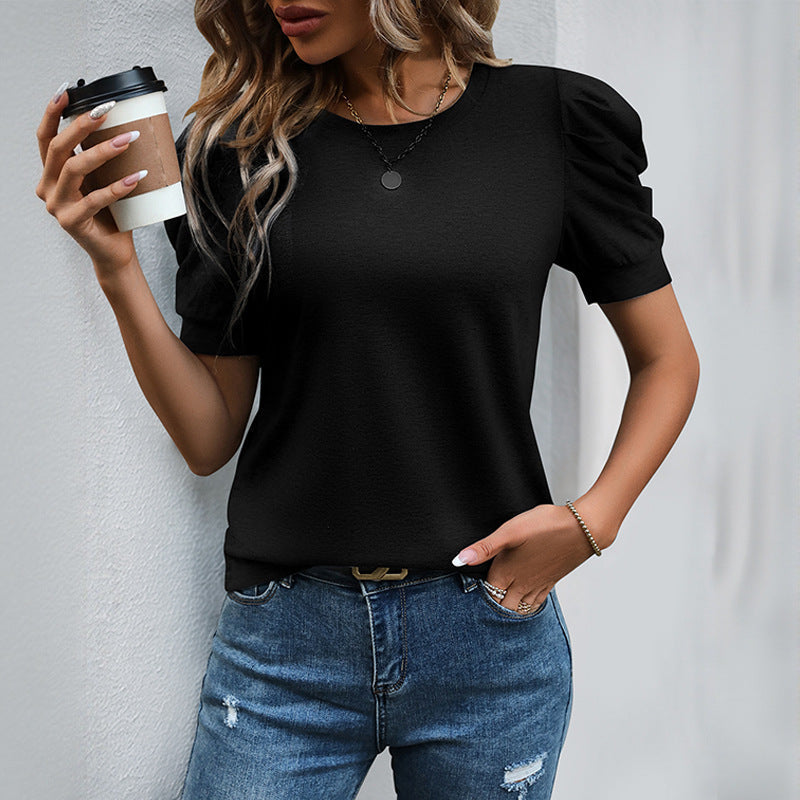 Women's short-sleeved shirt with unusual puff sleeves, size