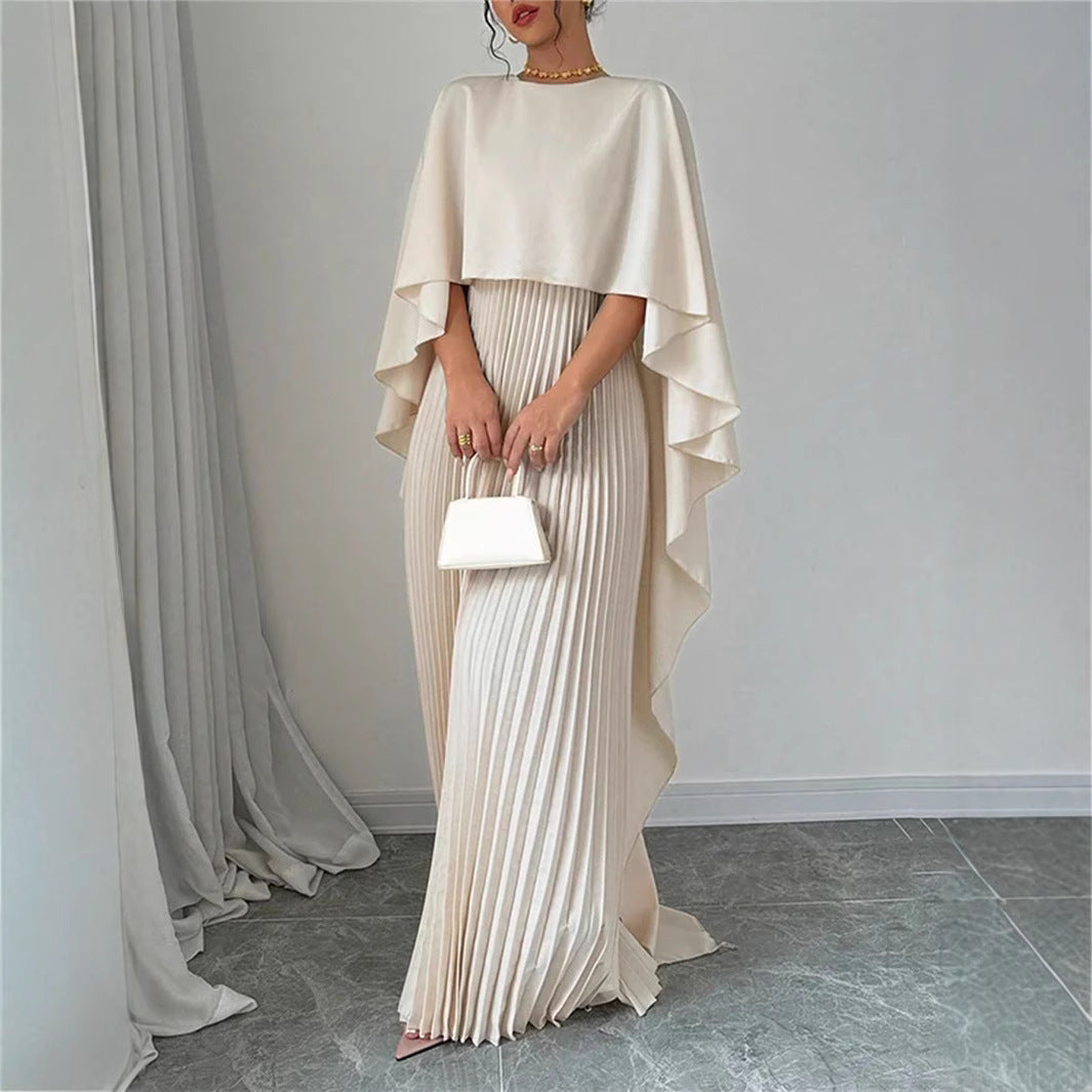 GR | Elegant long dress with batwing sleeves, pleated asymmetrical design, and flowing fit