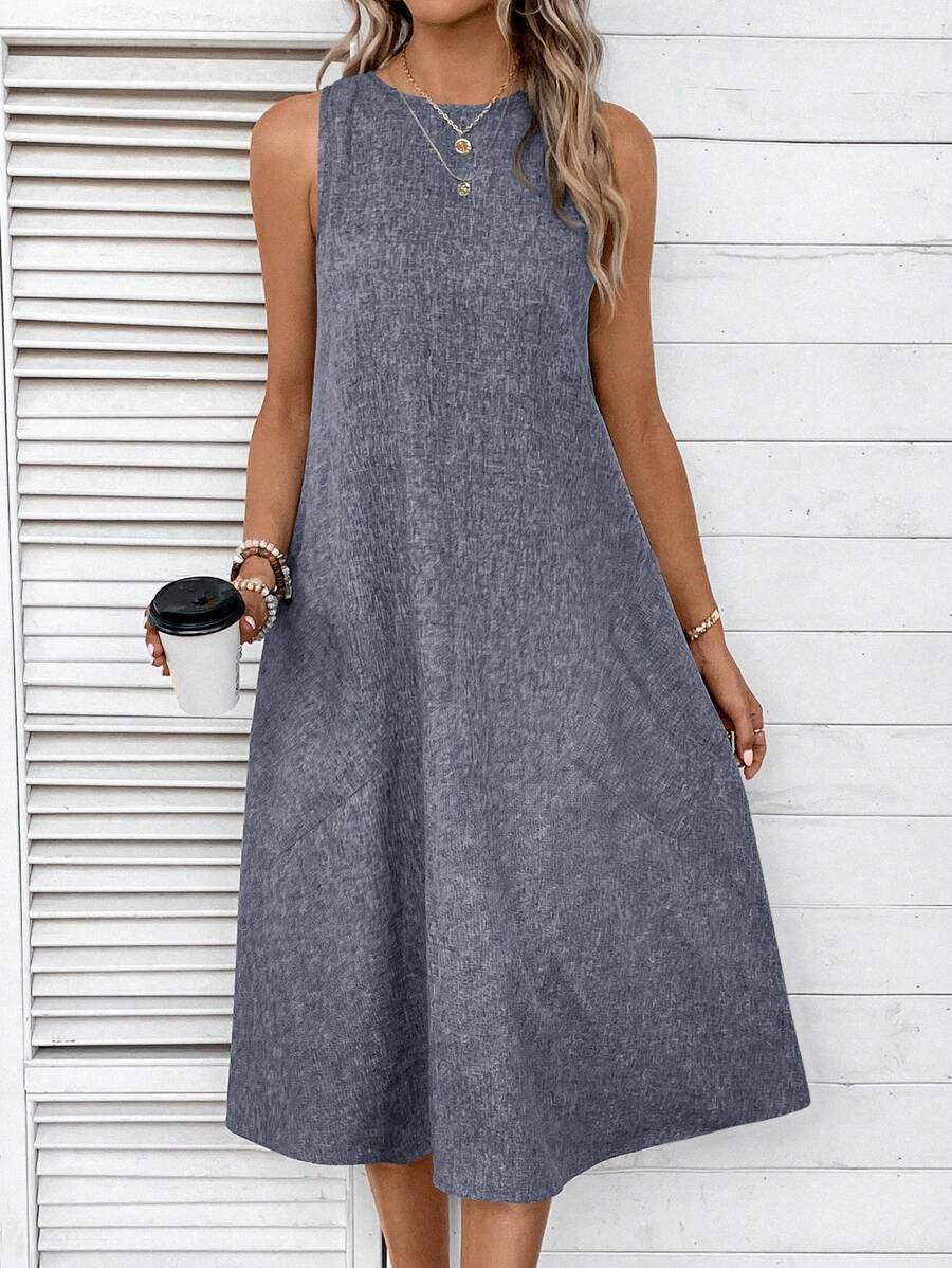Women's casual midi dress with a deep neckline and practical pockets, size S