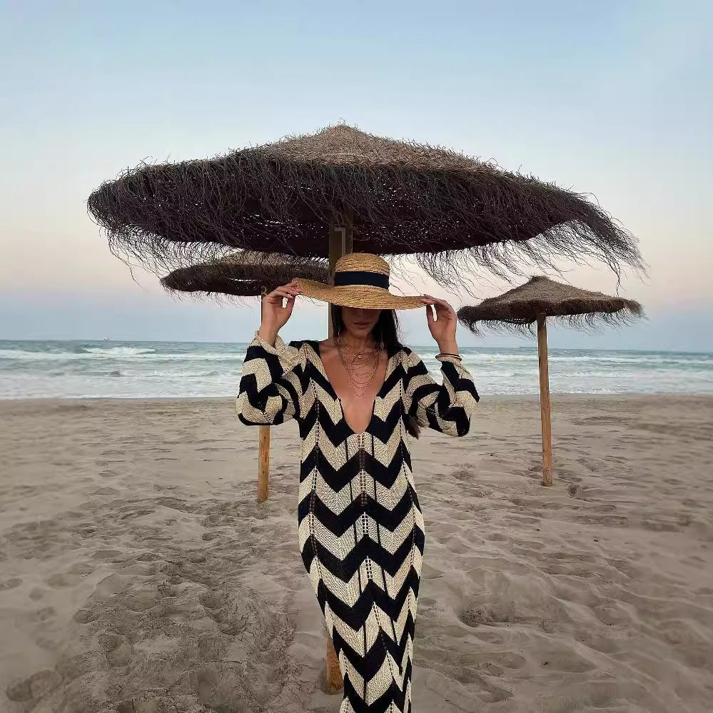 Women's knitted dress with a modern zigzag pattern and deep V-neck, size [size missing]