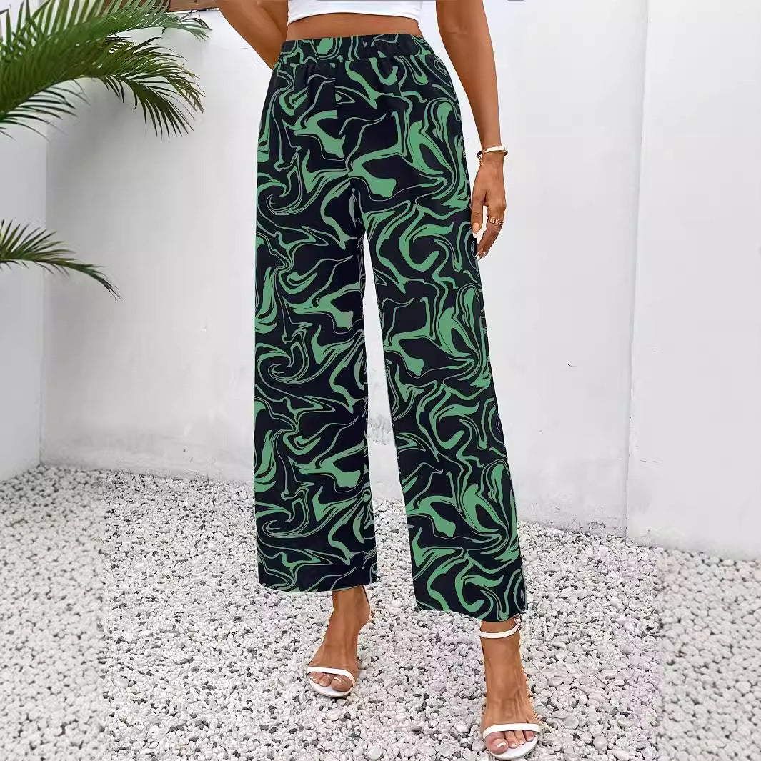 Women's wide-leg palazzo trousers with a modern marble print and elasticated waistband, size S