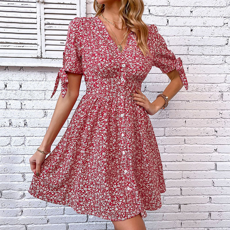 Women's blouse dress with floral patterns and playful ruffles, size