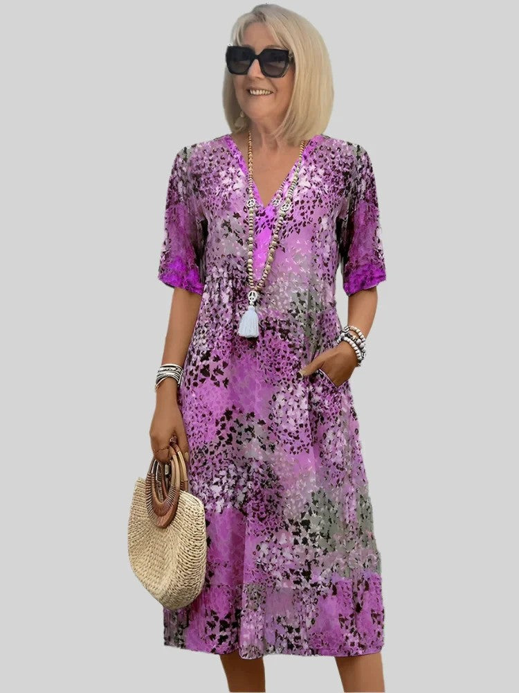 Women's loose summer dress with V-neck and pockets